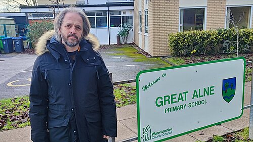 Cllr James Norris outside Great Alne school